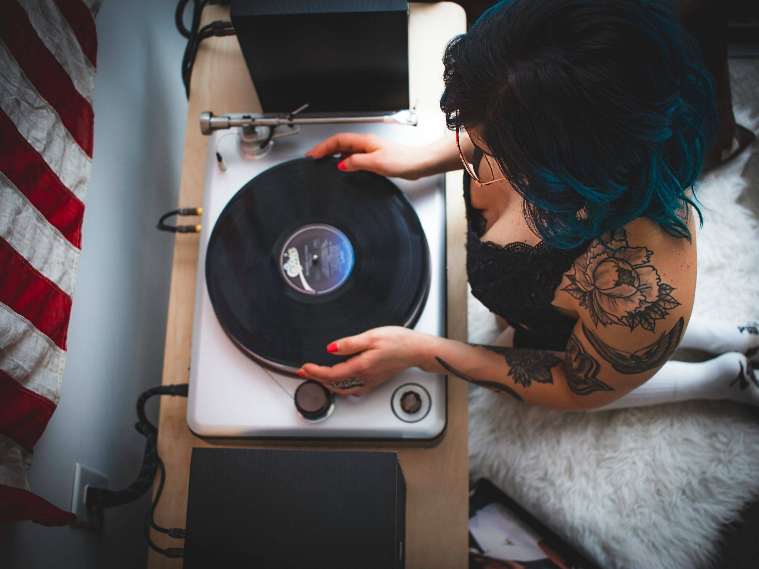 Infographic displaying Spotify playlist analytics split by genre and listener demographics